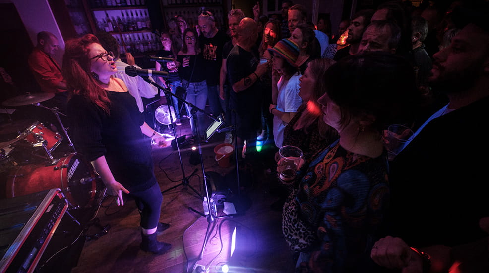 Woman singing on stage at Balstock Festival